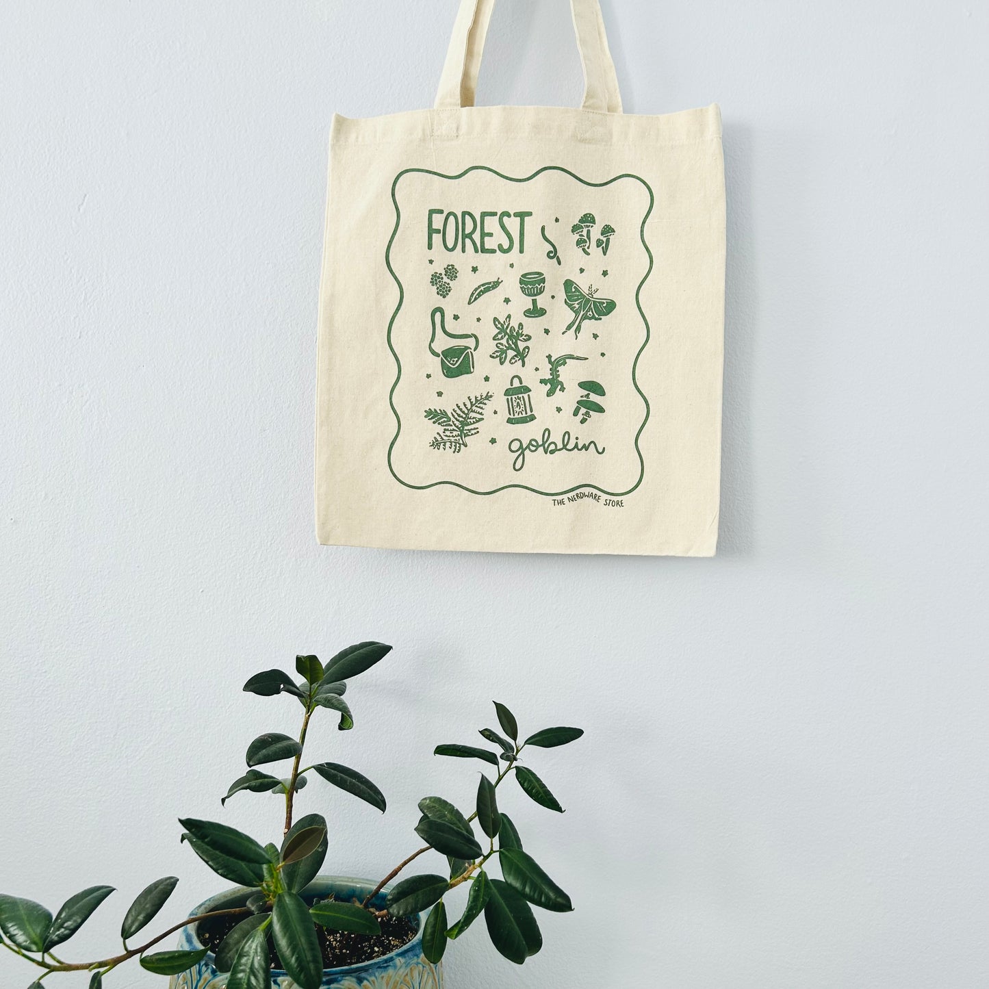 Tote bag with 'Forest Goblins' design on a light gray background