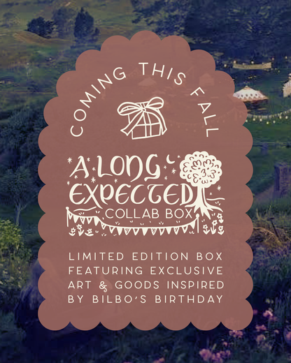 On a dusty cinnamon brown scalloped banner, text reads: "coming this fall, a long expected collab box - limited edition box featuring exclusive art & goods inspired by Bilbo's Birthday.