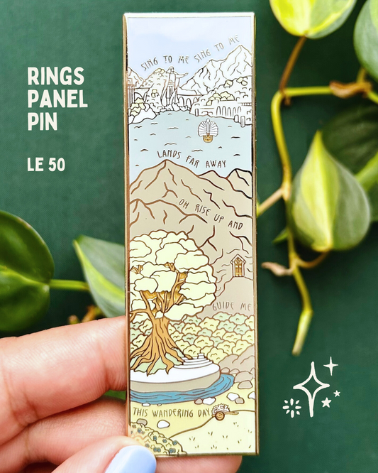 Rings Panel Pin - LE 50 - Close up of a hand holding a vertical enamel pin with scenes from the Rings of Power and the words "sing to me sing to me lands far away oh rise up and guide me this wandering day"