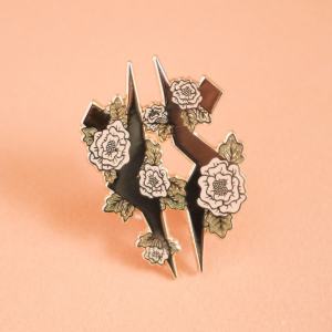 fulcrum pin with flowers in pink and leaves in green